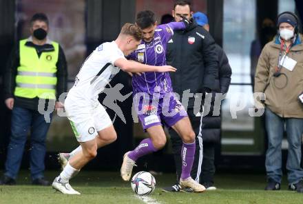 Fussball. Bundesliga. SK Austria Klagenfurt gegen  SK Puntigamer Sturm Graz.  Darijo Pecirep,  (Klagenfurt), Alexander Prass (Graz). Klagenfurt, am 12.12.2021.
Foto: Kuess
www.qspictures.net
---
pressefotos, pressefotografie, kuess, qs, qspictures, sport, bild, bilder, bilddatenbank