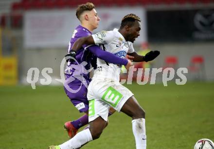 Fussball. Bundesliga. SK Austria Klagenfurt gegen  SK Puntigamer Sturm Graz. Fabio Markelic,   (Klagenfurt), Dogbole Franck Anderson Niangbo (Graz). Klagenfurt, am 12.12.2021.
Foto: Kuess
www.qspictures.net
---
pressefotos, pressefotografie, kuess, qs, qspictures, sport, bild, bilder, bilddatenbank