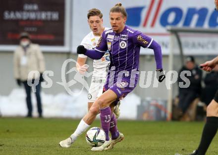 Fussball. Bundesliga. SK Austria Klagenfurt gegen  SK Puntigamer Sturm Graz. Patrick Greil,   (Klagenfurt), Alexander Prass (Graz). Klagenfurt, am 12.12.2021.
Foto: Kuess
www.qspictures.net
---
pressefotos, pressefotografie, kuess, qs, qspictures, sport, bild, bilder, bilddatenbank