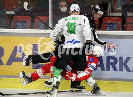 EBEL. Eishockey Bundesliga. KAC gegen	HK SZ Olimpija. Johannes Bischofberger,  (KAC),  Miha Stebih (Olimpija). Klagenfurt, am 17.12.2021.
Foto: Kuess
www.qspictures.net

---
pressefotos, pressefotografie, kuess, qs, qspictures, sport, bild, bilder, bilddatenbank