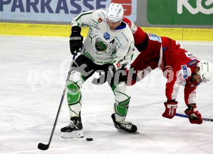 EBEL. Eishockey Bundesliga. KAC gegen	HK SZ Olimpija. Thomas Koch,  (KAC), Kristjan Cepon  (Olimpija). Klagenfurt, am 17.12.2021.
Foto: Kuess
www.qspictures.net

---
pressefotos, pressefotografie, kuess, qs, qspictures, sport, bild, bilder, bilddatenbank