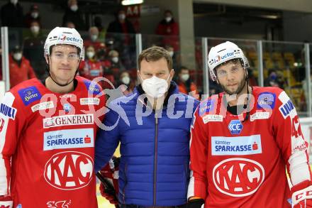 EBEL. Eishockey Bundesliga. KAC gegen	Moser Medical Graz99ers.  Ticar Rok, Petersen Nicholas Eric (KAC). Klagenfurt, am 19.12.2021.
Foto: Kuess
www.qspictures.net

---
pressefotos, pressefotografie, kuess, qs, qspictures, sport, bild, bilder, bilddatenbank
