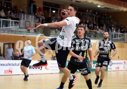 Handball. SC Ferlach gegen Baernbach/Koeflach.  Mladan Jovanovic, (SCF),  Sebastian Hutecek  (Baernbach/Koeflach). Ferlach, am 18.12.2021.
Foto: Kuess
---
pressefotos, pressefotografie, kuess, qs, qspictures, sport, bild, bilder, bilddatenbank