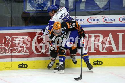 EBEL. Eishockey Bundesliga. VSV gegen Steinbach Black Wings Linz.  Renars Krastenbergs,  (VSV),  Will Pelletier (Linz). Villach, am 21.12.2021.
Foto: Kuess
www.qspictures.net
---
pressefotos, pressefotografie, kuess, qs, qspictures, sport, bild, bilder, bilddatenbank