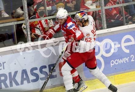 EBEL. Eishockey Bundesliga. KAC gegen	EC Red Bull Salzburg. Vallant Thomas (KAC), Huber Paul   (Salzburg). Klagenfurt, am 21.12.2021.
Foto: Kuess
www.qspictures.net

---
pressefotos, pressefotografie, kuess, qs, qspictures, sport, bild, bilder, bilddatenbank