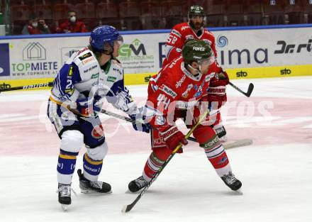 EBEL. Eishockey Bundesliga. VSV gegen HCB Suedtirol Alperia.  Yannic Pilloni,  (VSV), Nicholas Plastino  (Bozen). Villach, am 30.12.2021.
Foto: Kuess
www.qspictures.net
---
pressefotos, pressefotografie, kuess, qs, qspictures, sport, bild, bilder, bilddatenbank