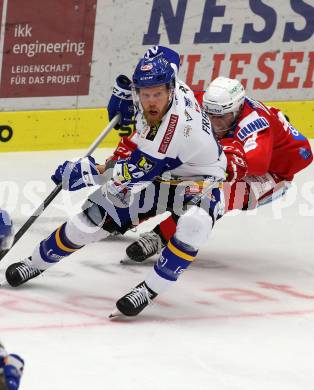 EBEL. Eishockey Bundesliga. VSV gegen KAC.  Jamie Fraser,  (VSV),  Fabian Hochegger (KAC). Villach, am 4.1.2022.
Foto: Kuess
www.qspictures.net
---
pressefotos, pressefotografie, kuess, qs, qspictures, sport, bild, bilder, bilddatenbank