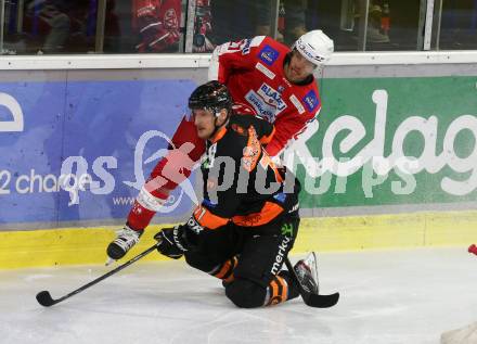 EBEL. Eishockey Bundesliga. KAC gegen	Moser Medical Graz99ers. Thomas Hundertpfund,  (KAC), Simon Hjalmarsson  (Graz). Klagenfurt, am 6.1.2022.
Foto: Kuess
www.qspictures.net

---
pressefotos, pressefotografie, kuess, qs, qspictures, sport, bild, bilder, bilddatenbank