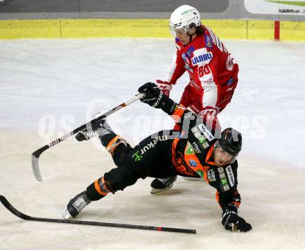 EBEL. Eishockey Bundesliga. KAC gegen	Moser Medical Graz99ers. Nikolaus Kraus,  (KAC), Erik Kirchschlaeger  (Graz). Klagenfurt, am 6.1.2022.
Foto: Kuess
www.qspictures.net

---
pressefotos, pressefotografie, kuess, qs, qspictures, sport, bild, bilder, bilddatenbank