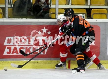 EBEL. Eishockey Bundesliga. KAC gegen	Moser Medical Graz99ers. Samuel Witting,  (KAC), Mike Zalewski  (Graz). Klagenfurt, am 6.1.2022.
Foto: Kuess
www.qspictures.net

---
pressefotos, pressefotografie, kuess, qs, qspictures, sport, bild, bilder, bilddatenbank