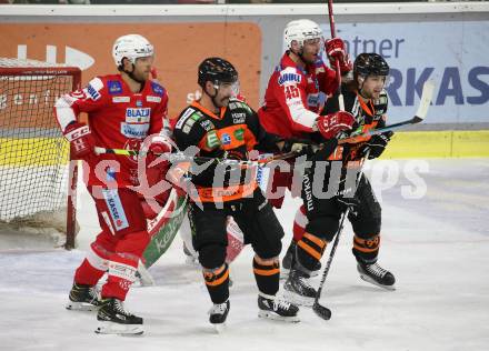 EBEL. Eishockey Bundesliga. KAC gegen	Moser Medical Graz99ers. Thomas Hundertpfund, Andrej Tavzelj,  (KAC), Michael Schiechl, Andrew Gordon  (Graz). Klagenfurt, am 6.1.2022.
Foto: Kuess
www.qspictures.net

---
pressefotos, pressefotografie, kuess, qs, qspictures, sport, bild, bilder, bilddatenbank