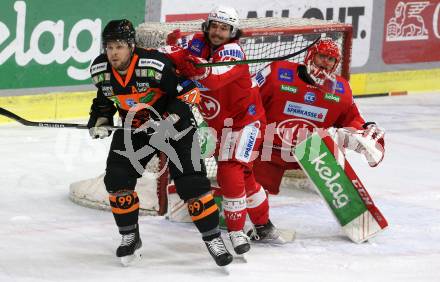 EBEL. Eishockey Bundesliga. KAC gegen	Moser Medical Graz99ers. Samuel Witting, Sebastian Dahm,  (KAC),  Andrew Gordon (Graz). Klagenfurt, am 6.1.2022.
Foto: Kuess
www.qspictures.net

---
pressefotos, pressefotografie, kuess, qs, qspictures, sport, bild, bilder, bilddatenbank