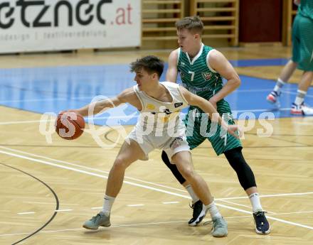Basketball Zweite Liga 2021/2022. Grunddurchgang 12. Runde.  Woerthersee Piraten gegen KOS Celovec. Felix Leindecker  (Piraten), Valentin Pasterk (KOS). Klagenfurt, am 8.1.2022. 
Foto: Kuess
www.qspictures.net

---
pressefotos, pressefotografie, kuess, qs, qspictures, sport, bild, bilder, bilddatenbank