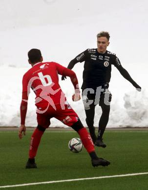 Fussball Testspiel. SK Austria Klagenfurt gegen SV Spittal. Lukas Fridrikas (Klagenfurt),  Rafael Graf  (Spittal). Moosburg, am 15.1.2022.
Foto: Kuess
www.qspictures.net
---
pressefotos, pressefotografie, kuess, qs, qspictures, sport, bild, bilder, bilddatenbank
