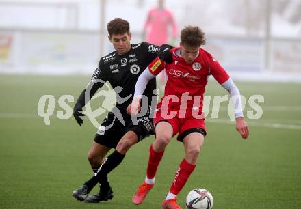 Fussball Testspiel. SK Austria Klagenfurt gegen SV Spittal. Alexander Fuchs, (Klagenfurt), Maximilian Fillafer  (Spittal). Moosburg, am 15.1.2022.
Foto: Kuess
www.qspictures.net
---
pressefotos, pressefotografie, kuess, qs, qspictures, sport, bild, bilder, bilddatenbank