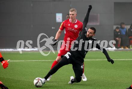 Fussball Testspiel. SK Austria Klagenfurt gegen SV Spittal. Markus Pink, (Klagenfurt), Adnan Hajdarevic  (Spittal). Moosburg, am 15.1.2022.
Foto: Kuess
www.qspictures.net
---
pressefotos, pressefotografie, kuess, qs, qspictures, sport, bild, bilder, bilddatenbank
