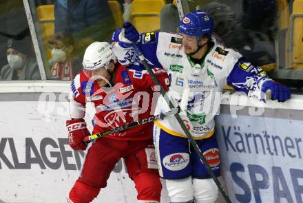 EBEL. Eishockey Bundesliga. KAC gegen	VSV. Manuel Geier, (KAC),  Stefan Bacher  (VSV). Klagenfurt, am 25.1.2022.
Foto: Kuess
www.qspictures.net

---
pressefotos, pressefotografie, kuess, qs, qspictures, sport, bild, bilder, bilddatenbank
