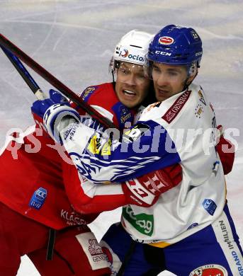 EBEL. Eishockey Bundesliga. KAC gegen	VSV. Matthew Fraser,  (KAC),   Brett Flemming (VSV). Klagenfurt, am 25.1.2022.
Foto: Kuess
www.qspictures.net

---
pressefotos, pressefotografie, kuess, qs, qspictures, sport, bild, bilder, bilddatenbank