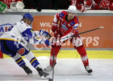 EBEL. Eishockey Bundesliga. KAC gegen	VSV. Matthew Fraser,  (KAC),   Stefan Bacher (VSV). Klagenfurt, am 25.1.2022.
Foto: Kuess
www.qspictures.net

---
pressefotos, pressefotografie, kuess, qs, qspictures, sport, bild, bilder, bilddatenbank
