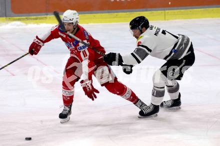 EBEL. Eishockey Bundesliga. KAC gegen	Dornbirn Bulldogs. Lukas Haudum (KAC), Kevin Macierzynski (Dornbirn Bulldogs). Klagenfurt, am 28.1.2022.
Foto: Kuess
www.qspictures.net

---
pressefotos, pressefotografie, kuess, qs, qspictures, sport, bild, bilder, bilddatenbank