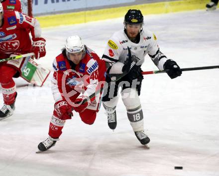 EBEL. Eishockey Bundesliga. KAC gegen	Dornbirn Bulldogs. Samuel Witting (KAC), Kevin Hancock (Dornbirn Bulldogs). Klagenfurt, am 28.1.2022.
Foto: Kuess
www.qspictures.net

---
pressefotos, pressefotografie, kuess, qs, qspictures, sport, bild, bilder, bilddatenbank