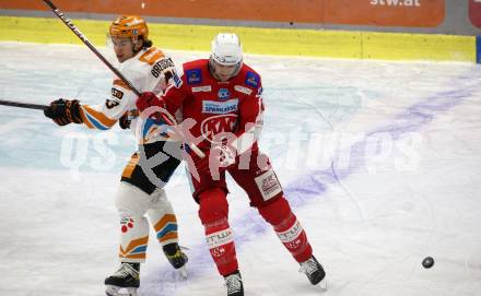 EBEL. Eishockey Bundesliga. KAC gegen	Steinbach Black Wings Linz. Paul Postma,  (KAC), Niklas Bretschneider  (Linz). Klagenfurt, am 8.2.2022.
Foto: Kuess
www.qspictures.net

---
pressefotos, pressefotografie, kuess, qs, qspictures, sport, bild, bilder, bilddatenbank