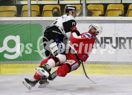 EBEL. Eishockey Bundesliga. KAC gegen	Tesla Orli Znojmo. Martin Schumnig,  (KAC), Tor Eriksson Immo  (Znojmo). Klagenfurt, am 18.2.2022.
Foto: Kuess
www.qspictures.net

---
pressefotos, pressefotografie, kuess, qs, qspictures, sport, bild, bilder, bilddatenbank