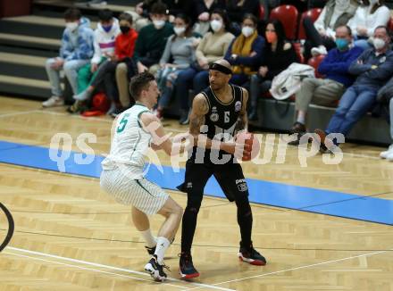 Basketball 2. Liga 2021/2022. Grunddurchgang 15. Runde.  KOS Celovec gegen  Woerthersee Piraten.  Andi Smrtnik (KOS), Shawn Ray  (Piraten). Klagenfurt, am 25.2.2022.
Foto: Kuess
www.qspictures.net
---
pressefotos, pressefotografie, kuess, qs, qspictures, sport, bild, bilder, bilddatenbank