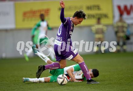 Fussball Bundesliga. Play-off. SK Austria Klagenfurt gegen Rapid Wien.  Lukas Fridrikas,  (Klagenfurt),Yusuf Demir   (Rapid). Klagenfurt, am 13.3.2022.
Foto: Kuess
www.qspictures.net
---
pressefotos, pressefotografie, kuess, qs, qspictures, sport, bild, bilder, bilddatenbank