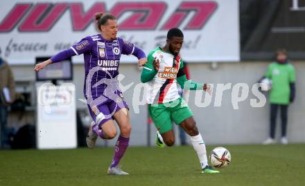 Fussball Bundesliga. Play-off. SK Austria Klagenfurt gegen Rapid Wien.  Patrick Greil, (Klagenfurt),  Kelvin Arase  (Rapid). Klagenfurt, am 13.3.2022.
Foto: Kuess
www.qspictures.net
---
pressefotos, pressefotografie, kuess, qs, qspictures, sport, bild, bilder, bilddatenbank