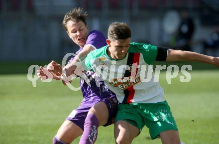 Fussball Bundesliga. Play-off. SK Austria Klagenfurt gegen Rapid Wien.  Alex Timossi Andersson, (Klagenfurt), Martin Moormann   (Rapid). Klagenfurt, am 13.3.2022.
Foto: Kuess
www.qspictures.net
---
pressefotos, pressefotografie, kuess, qs, qspictures, sport, bild, bilder, bilddatenbank