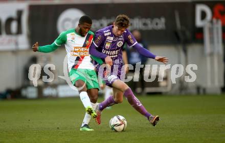 Fussball Bundesliga. Play-off. SK Austria Klagenfurt gegen Rapid Wien.  Ivan Saravanjha,  (Klagenfurt), Kelvin Arase  (Rapid). Klagenfurt, am 13.3.2022.
Foto: Kuess
www.qspictures.net
---
pressefotos, pressefotografie, kuess, qs, qspictures, sport, bild, bilder, bilddatenbank