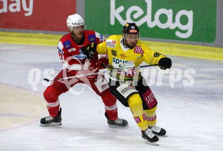 EBEL. Eishockey Bundesliga. KAC gegen	spusu Vienna Capitals. Manuel Geier, (KAC), Nikolaus Hartl   (Vienna Capitals). Klagenfurt, am 13.3.2022.
Foto: Kuess
www.qspictures.net

---
pressefotos, pressefotografie, kuess, qs, qspictures, sport, bild, bilder, bilddatenbank