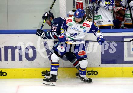 EBEL. Eishockey Bundesliga. VSV gegen Hydro Fehervar AV 19.  Renars Krastenbergs,  (VSV), Akos Mihaly  (Hydro Fehervar). Villach, am 1.4.2022.
Foto: Kuess
www.qspictures.net
---
pressefotos, pressefotografie, kuess, qs, qspictures, sport, bild, bilder, bilddatenbank