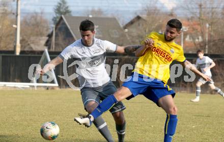 Fussball 2. Klasse B. SG KSK-Woerthersee/ATUS Poertschach gegen Afritz.  Fabian Krenn (KSK-Woerthersee/Poertschach),  Haris Dindic (Afritz). Krumpendorf, 26.3.2022.
Foto: Kuess

---
pressefotos, pressefotografie, kuess, qs, qspictures, sport, bild, bilder, bilddatenbank