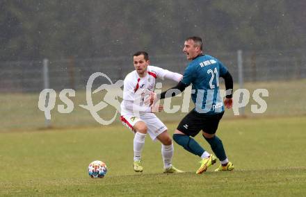 Fussball Kaerntner Liga. Kraig gegen Gmuend.  Imran Khazhmagamadov (Kraig), Marco Moser  (Gmuend). Kraig, am 2.4.2022.
Foto: Kuess
---
pressefotos, pressefotografie, kuess, qs, qspictures, sport, bild, bilder, bilddatenbank