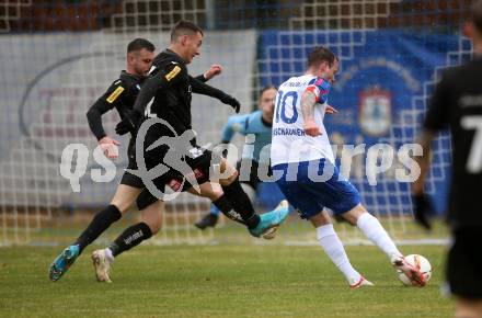 Fussball Regionalliga. Treibach gegen Spittal.  Kevin Vaschauner (Treibach),   Dino Keric (Spittal). Treibach, 2.4.2022.
Foto: Kuess
---
pressefotos, pressefotografie, kuess, qs, qspictures, sport, bild, bilder, bilddatenbank