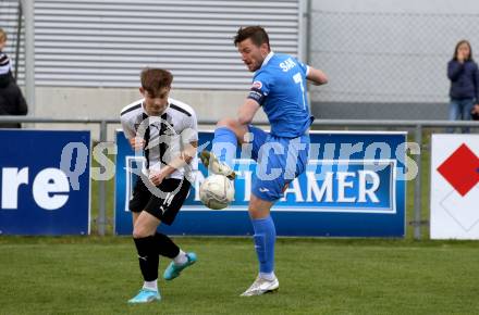 Fussball Kaerntner Liga. Bleiburg gegen SAK.  Marcel Moertl (Bleiburg),  Darjan Aleksic  (SAK). Bleiburg, 16.4.2022.
Foto: Kuess
---
pressefotos, pressefotografie, kuess, qs, qspictures, sport, bild, bilder, bilddatenbank