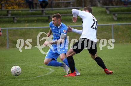 Fussball Kaerntner Liga. Bleiburg gegen SAK.  Grega Klaric (Bleiburg),    Marko Gajic (SAK). Bleiburg, 16.4.2022.
Foto: Kuess
---
pressefotos, pressefotografie, kuess, qs, qspictures, sport, bild, bilder, bilddatenbank