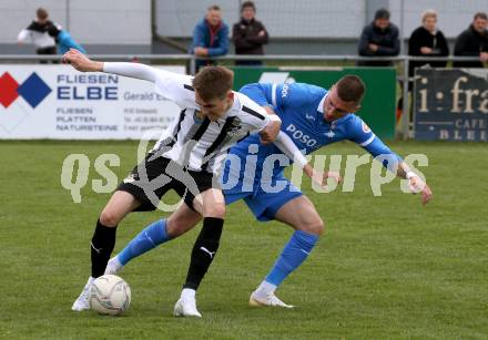 Fussball Kaerntner Liga. Bleiburg gegen SAK.  Mathias Robert Knauder (Bleiburg),  Zoran Vukovic  (SAK). Bleiburg, 16.4.2022.
Foto: Kuess
---
pressefotos, pressefotografie, kuess, qs, qspictures, sport, bild, bilder, bilddatenbank