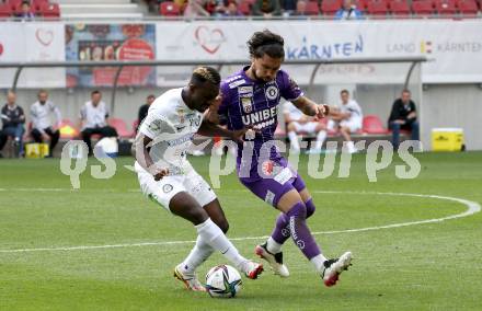 Fussball Bundesliga. Play-off. SK Austria Klagenfurt gegen SK Sturm Graz.  Maximiliano Moreira Romero,  (Klagenfurt), Niangbo Dogbole Franck Anderson  (Graz). Klagenfurt, am 8.5.2022.
Foto: Kuess
www.qspictures.net
---
pressefotos, pressefotografie, kuess, qs, qspictures, sport, bild, bilder, bilddatenbank