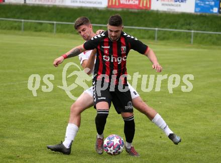 Fussball. Kaerntner Liga. Admira Villach gegen Maria Saal.  Mario Dolinar (Admira Villach),  Aljaz Pavlin  (Maria Saal). Villach, 14.5.2022.
Foto: Kuess
---
pressefotos, pressefotografie, kuess, qs, qspictures, sport, bild, bilder, bilddatenbank