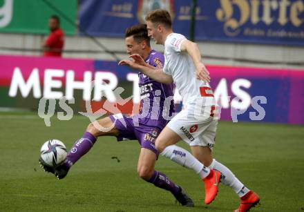 Fussball Bundesliga. Play-off. SK Austria Klagenfurt gegen FK Austria Wien.  Till Sebastian Schumacher, (Klagenfurt), Aleksandar Jukic   (Wien). Klagenfurt, am 15.5.2022.
Foto: Kuess
www.qspictures.net
---
pressefotos, pressefotografie, kuess, qs, qspictures, sport, bild, bilder, bilddatenbank