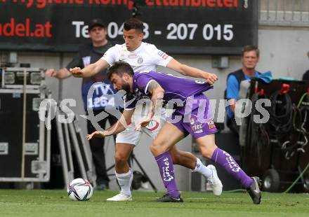 Fussball Bundesliga. Play-off. SK Austria Klagenfurt gegen FK Austria Wien.  Kosmas Gkezos, (Klagenfurt), Manfred Fischer   (Wien). Klagenfurt, am 15.5.2022.
Foto: Kuess
www.qspictures.net
---
pressefotos, pressefotografie, kuess, qs, qspictures, sport, bild, bilder, bilddatenbank