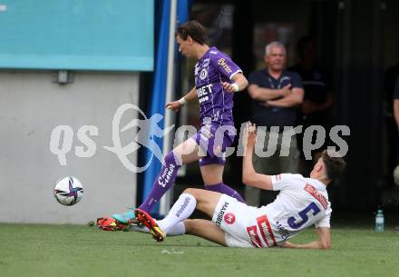 Fussball Bundesliga. Play-off. SK Austria Klagenfurt gegen FK Austria Wien.  Alex Timossi Andersson,  (Klagenfurt), Eric Martel  (Wien). Klagenfurt, am 15.5.2022.
Foto: Kuess
www.qspictures.net
---
pressefotos, pressefotografie, kuess, qs, qspictures, sport, bild, bilder, bilddatenbank