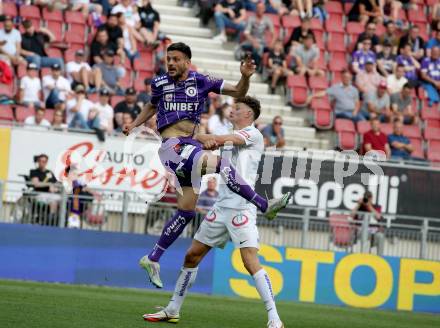 Fussball Bundesliga. Play-off. SK Austria Klagenfurt gegen FK Austria Wien.  Darijo Pecirep,  (Klagenfurt), Eric Martel (Wien). Klagenfurt, am 15.5.2022.
Foto: Kuess
www.qspictures.net
---
pressefotos, pressefotografie, kuess, qs, qspictures, sport, bild, bilder, bilddatenbank