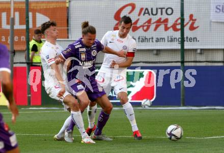 Fussball Bundesliga. Play-off. SK Austria Klagenfurt gegen FK Austria Wien.  Patrick Greil,  (Klagenfurt),  Eric Martel, Markus Suttner (Wien). Klagenfurt, am 15.5.2022.
Foto: Kuess
www.qspictures.net
---
pressefotos, pressefotografie, kuess, qs, qspictures, sport, bild, bilder, bilddatenbank