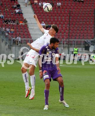 Fussball Bundesliga. Play-off. SK Austria Klagenfurt gegen FK Austria Wien.  Markus Pink,  (Klagenfurt), Eric Martel  (Wien). Klagenfurt, am 15.5.2022.
Foto: Kuess
www.qspictures.net
---
pressefotos, pressefotografie, kuess, qs, qspictures, sport, bild, bilder, bilddatenbank