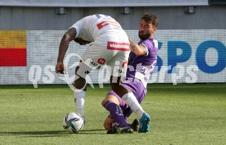 Fussball Bundesliga. Play-off. SK Austria Klagenfurt gegen FK Austria Wien.  Kosmas Gkezos, (Klagenfurt),  Noah Ohio (Wien). Klagenfurt, am 15.5.2022.
Foto: Kuess
www.qspictures.net
---
pressefotos, pressefotografie, kuess, qs, qspictures, sport, bild, bilder, bilddatenbank