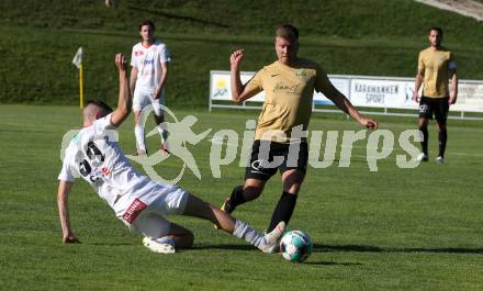 Fussball Kaerntner Liga. Koettmannsdorf gegen Maria Saal.   Michael Jakopitsch (Koettmannsdorf),  Kenen Bosnic (Maria Saal). Koettmannsdorf, am 11.6.2022.
Foto: Kuess
---
pressefotos, pressefotografie, kuess, qs, qspictures, sport, bild, bilder, bilddatenbank